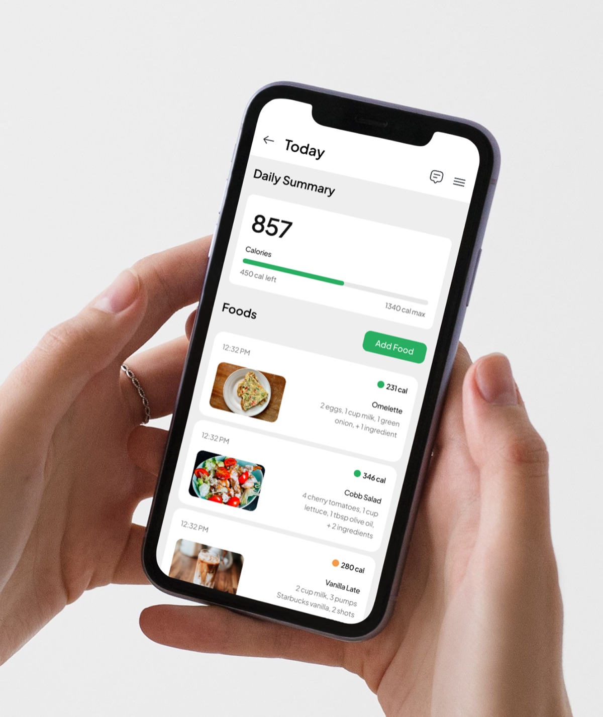 A calorie tracking app held in two hands, showing the day's total, a progress bar, and logged meals with photos