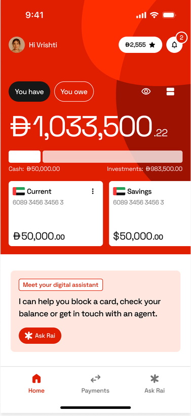 The RAKBANK app home screen showing account balances, a 'Meet your digital assistant' card offering to block a card or check a balance, and a bottom navigation bar with Home, Payments, and Ask Rai